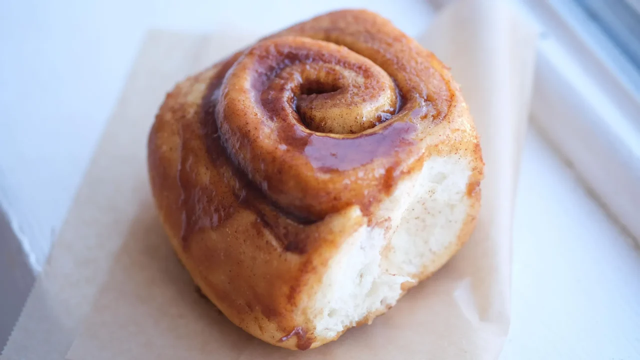 side view of cinnamon roll at sweet magnolia's in omaha nebraska